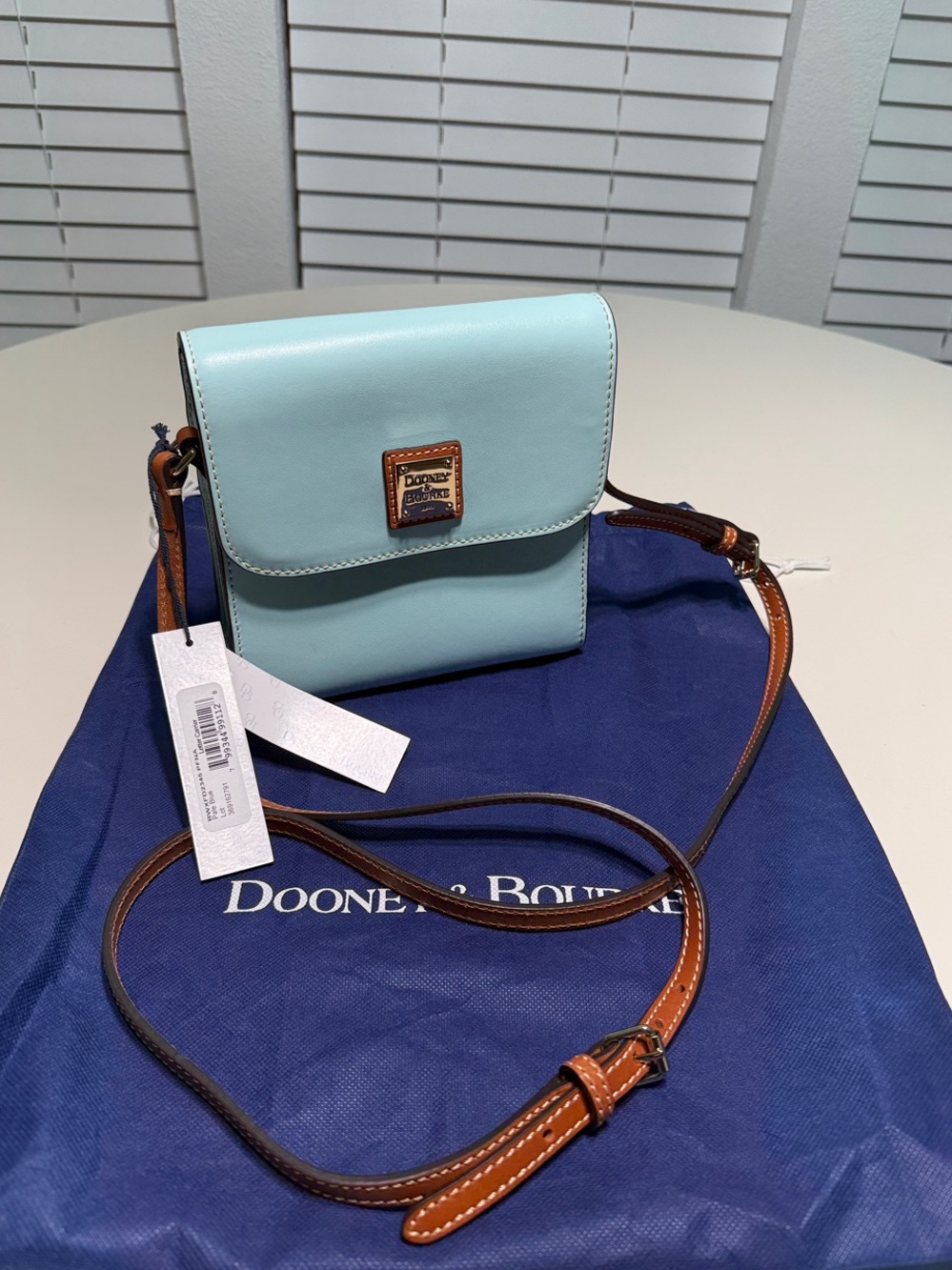 Dooney & Bourke Pale Blue Wexford Letter Carrier Crossbody with Tan Trim